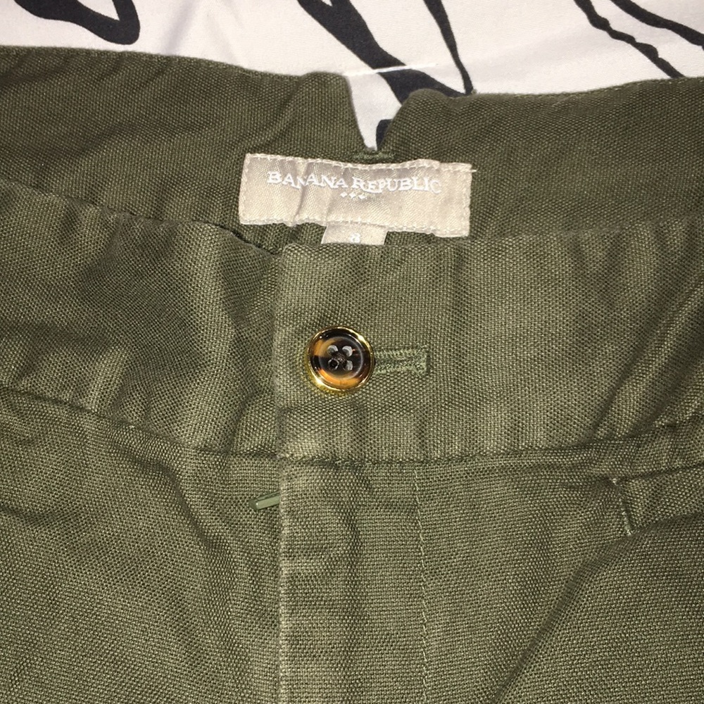 Olive green shorts.